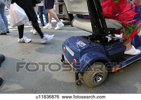 Stock Photograph - Back side of a scooter/cart.. Fotosearch