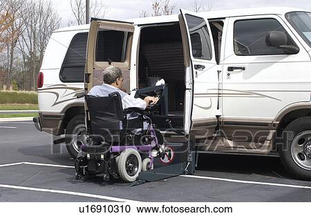 Man utilizing a wheelchair for mobility entering his van equipped with a wheelchair lift. View Large Photo Image Stock Image - Man utilizing a wheelchair for mobility entering his van equipped with a wheelchair lift.. Fotosearch