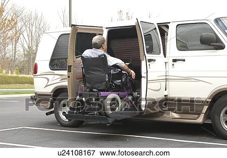 Man utilizing a wheelchair for mobility entering his van equipped with a wheelchair lift. View Large Photo Image Stock Photo - Man utilizing a wheelchair for mobility entering his van equipped with a wheelchair lift.. Fotosearch