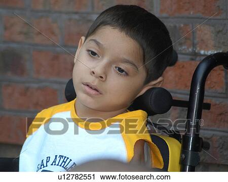 Close-up image of a beautiful little boy with physical disabilities. View Large Photo Image Stock Image - Close-up image of a beautiful little boy with physical disabilities.. Fotosearch