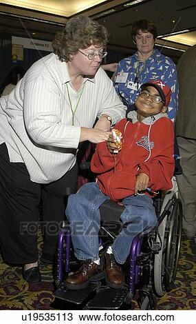 Little boy with multiple disabilities posing for the camera. View Large Photo Image Stock Image - Little boy with multiple disabilities posing for the camera.. Fotosearch