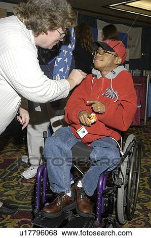 Little boy with multiple disabilities posing for the camera. View Large Photo Image Stock Photo - Little boy with multiple disabilities posing for the camera.. Fotosearch