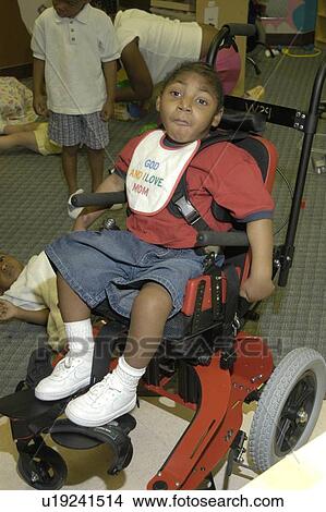 Little boy with severe/profound mental retardation and cerebral palsy. View Large Photo Image Picture - Little boy with severe/profound mental retardation and cerebral palsy.. Fotosearch