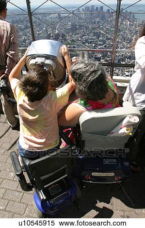 Mother and son with disabilities sightseeing while on vacation. View Large Photo Image Stock Photography - Mother and son with disabilities sightseeing while on vacation.. Fotosearch