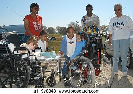 Several children with disabilities preparing for a trip to a petting zoo. View Large Photo Image Stock Image - Several children with disabilities preparing for a trip to a petting zoo.. Fotosearch