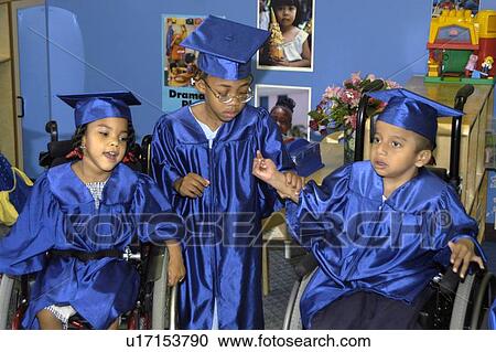 Three friends, all with various disabilities, getting ready to participate in their preschool graduation. View Large Photo Image Stock Image - Three friends, all with various disabilities, getting ready to participate in their preschool graduation.. Fotosearch