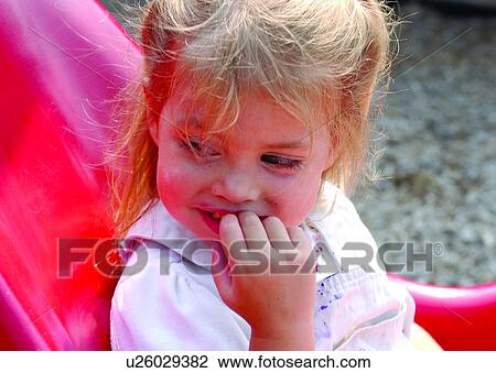 Absolutely adorable image of a little girl with blond hair who also has a disability. View Large Photo Image Stock Image - Absolutely adorable image of a little girl with blond hair who also has a disability.. Fotosearch
