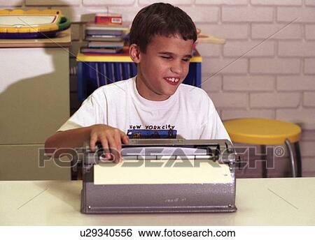 Cute little boy with multiple disabilities, including blindness, using a braille machine as he learns to type a letter. View Large Photo Image Stock Photograph - Cute little boy with multiple disabilities, including blindness, using a braille machine as he learns to type a letter.. Fotosearch
