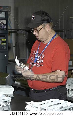 A man with a disability working in a commercial kitchen. View Large Photo Image Stock Image - A man with a disability working in a commercial kitchen.. Fotosearch