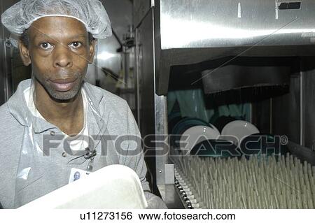 Man with disabilities in a commercial kitchen washing dishes. View Large Photo Image Stock Photograph - Man with disabilities in a commercial kitchen washing dishes.. Fotosearch