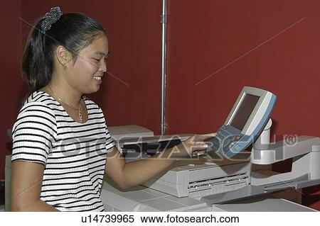 Woman with a disability in an office using a computer. View Large Photo Image Stock Photography - Woman with a disability in an office using a computer.. Fotosearch