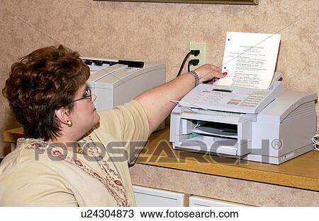 Woman with a disability utilizing a wheelchair for mobility sending a fax in here office. View Large Photo Image Stock Image - Woman with a disability utilizing a wheelchair for mobility sending a fax in here office.. Fotosearch