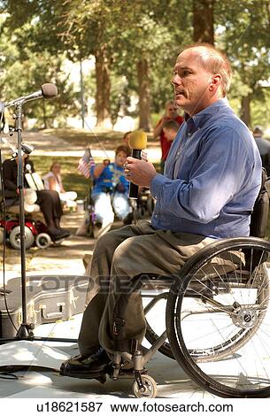 Chairman of the Council on Developmental Disabilities speaking at a state-wide Freedom Rally advocating for the civil rights of people with disabilities. View Large Photo Image Stock Photo - Chairman of the Council on Developmental Disabilities speaking at a state-wide Freedom Rally advocating for the civil rights of people with disabilities.. Fotosearch