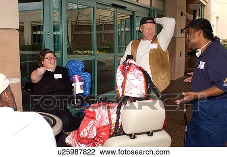 Group of individuals with disabilities talking and laughing during a conference break. View Large Photo Image Stock Image - Group of individuals with disabilities talking and laughing during a conference break.. Fotosearch