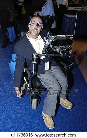 Stock Photograph - Man in wheelchair.. Fotosearch