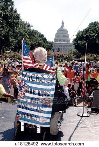 Person with a disability speaking to a crowd of people, while facing the United States Capitol. View Large Photo Image Stock Image - Person with a disability speaking to a crowd of people, while facing the United States Capitol.. Fotosearch
