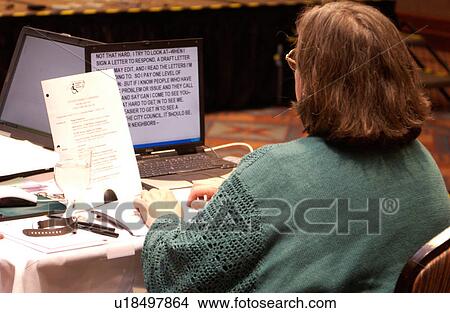 Picture - Woman providing real time captioning services for a disability rights conference.. Fotosearch