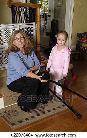 A grandmother enjoys time with her grand daughter. View Large Photo Image Picture - A grandmother enjoys time with her grand daughter.. Fotosearch