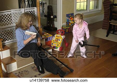 A grandmother enjoys time with her grand daughter. View Large Photo Image Stock Photo - A grandmother enjoys time with her grand daughter.. Fotosearch