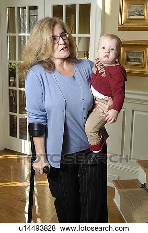 Stock Photo - A grandmother enjoys time with her grandson.. Fotosearch