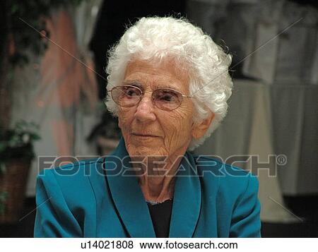Stock Photo - Elderly woman sitting.. Fotosearch