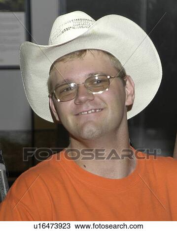 Stock Image - Smiling face of a man with disabilities.. Fotosearch