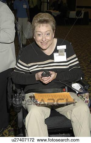 Woman with mobility impairments demonstrating the independence she has gained through the new features on her powered wheelchair. View Large Photo Image Stock Image - Woman with mobility impairments demonstrating the independence she has gained through the new features on her powered wheelchair.. Fotosearch