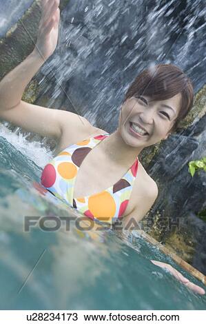 Young woman in a swimming pool, Saipan View Large Photo Image Stock Image - Young woman in a swimming pool, Saipan . Fotosearch