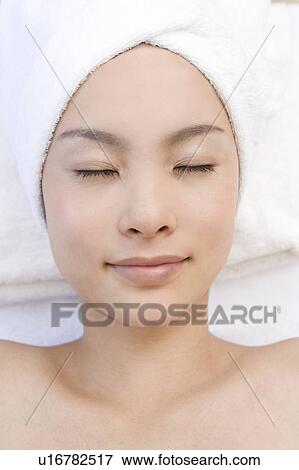 Young woman with towel wrapped around her head, Saipan View Large Photo Image Stock Photo - Young woman with towel wrapped around her head, Saipan. Fotosearch