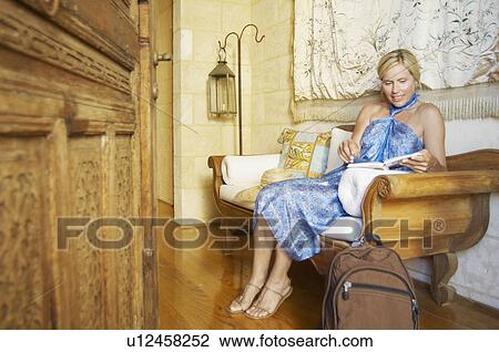 Mature woman in boutique hotel (portrait) View Large Photo Image Stock Image - Mature woman in boutique hotel (portrait). Fotosearch