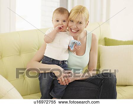 Stock Photography - Portrait of Mother and Baby Boy. Fotosearch