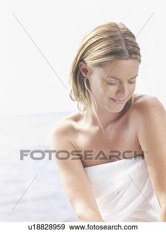 Woman wearing towel smiling. View Large Photo Image Stock Photo - Woman wearing towel smiling.. Fotosearch