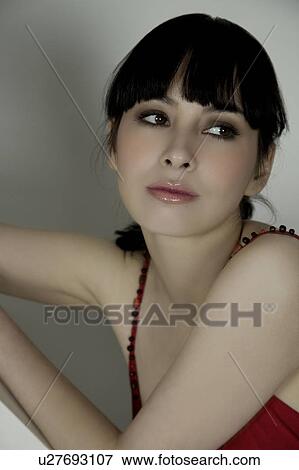 Portrait of a woman in red dress View Large Photo Image Stock Photo - Portrait of a woman in red dress. Fotosearch
