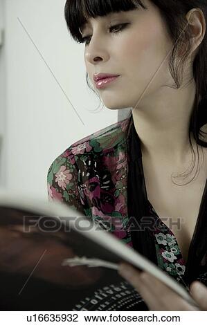 Portrait of a woman reading View Large Photo Image Stock Image - Portrait of a woman reading. Fotosearch