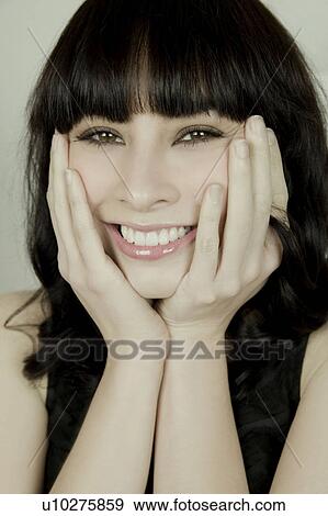 Stock Photo - Portrait of a woman. Fotosearch