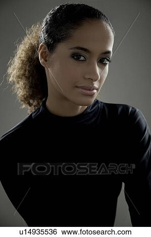 Stock Photograph - Portrait of a woman. Fotosearch