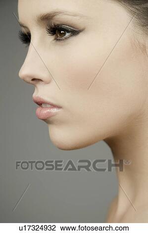 Stock Image - Side portrait of a woman. Fotosearch