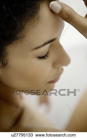 Stock Image - Woman's face close up.. Fotosearch