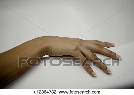 Stock Image - Woman's hand.. Fotosearch