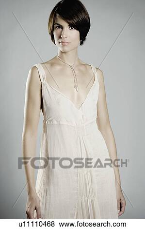 Portrait of woman standing. View Large Photo Image Stock Photo - Portrait of woman standing.. Fotosearch