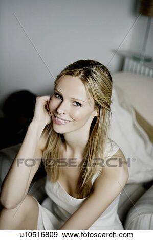 Woman sitting. View Large Photo Image Stock Photo - Woman sitting.. Fotosearch