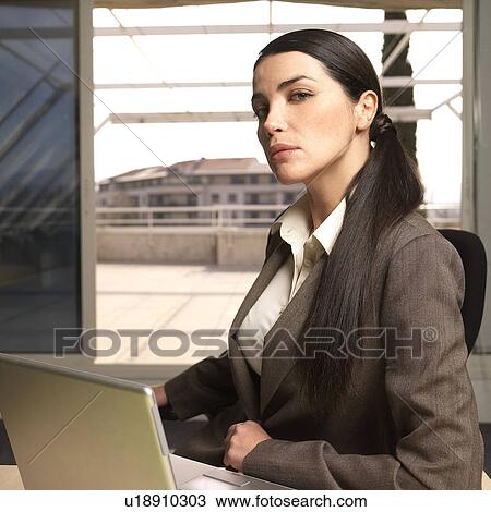 Woman with laptop, portrait View Large Photo Image Stock Image - Woman with laptop, portrait. Fotosearch
