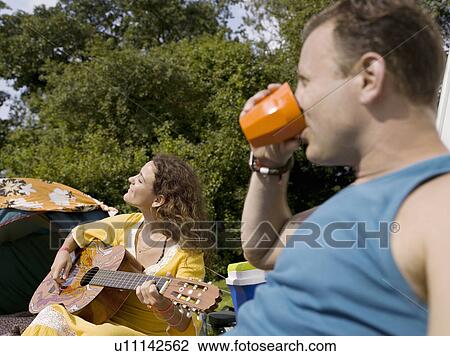 Woman and man at camp View Large Photo Image Stock Image - Woman and man at camp. Fotosearch