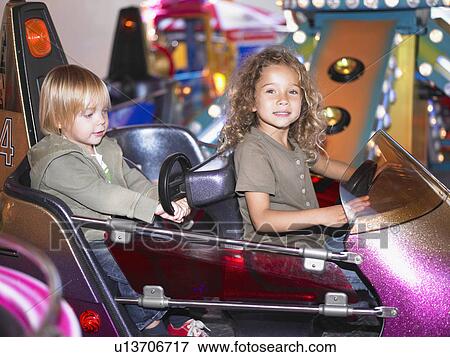 Little girls on merry go round. View Large Photo Image Stock Photo - Little girls on merry go round.. Fotosearch