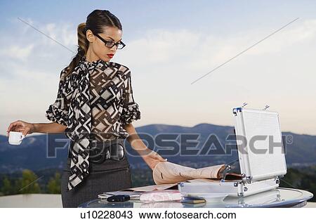 Woman working at home outdoors. View Large Photo Image Stock Image - Woman working at home outdoors.. Fotosearch