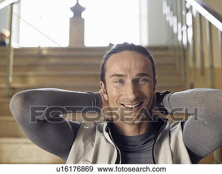 Mature man with hands behind head, smiling, portrait, close-up View Large Photo Image Stock Photo - Mature man with hands behind head, smiling, portrait, close-up. Fotosearch
