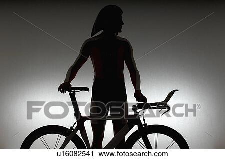 Cyclist with time trial bicycle. View Large Photo Image Stock Image - Cyclist with time trial bicycle.. Fotosearch