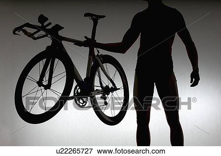 Cyclist with time trial bicycle. View Large Photo Image Stock Photo - Cyclist with time trial bicycle.. Fotosearch