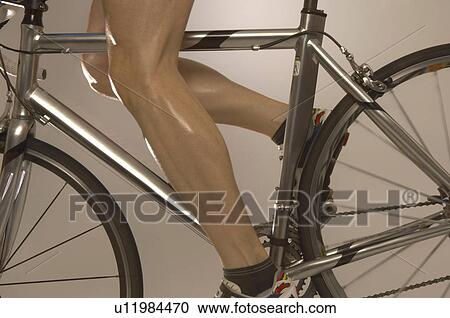 Man cycling View Large Photo Image Stock Image - Man cycling. Fotosearch