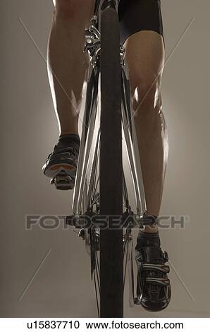 Man cycling View Large Photo Image Stock Image - Man cycling. Fotosearch